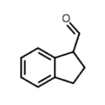 CAS 登录号：159496-97-6， 1-茚满甲醛